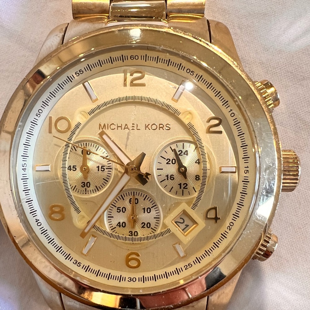 Michael Kors gold watch. (Battery needs replacement)
